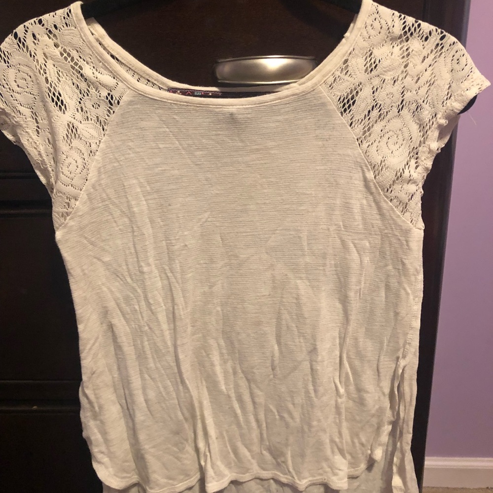 cream colored short sleeve tee shirt